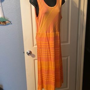 Super cute pink and orange tee shirt dress with open back